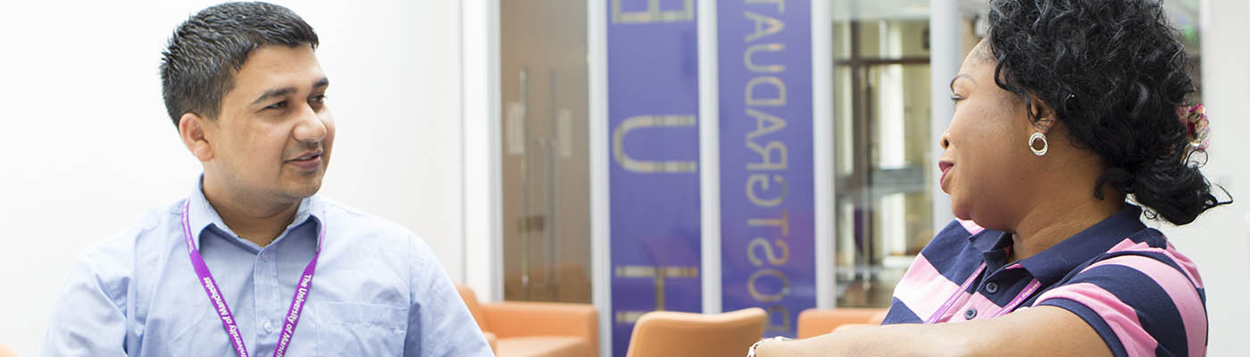 Students in the Postgraduate Hub.