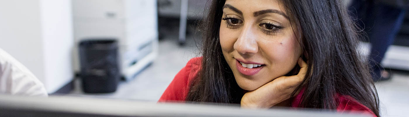 A student using a computer.